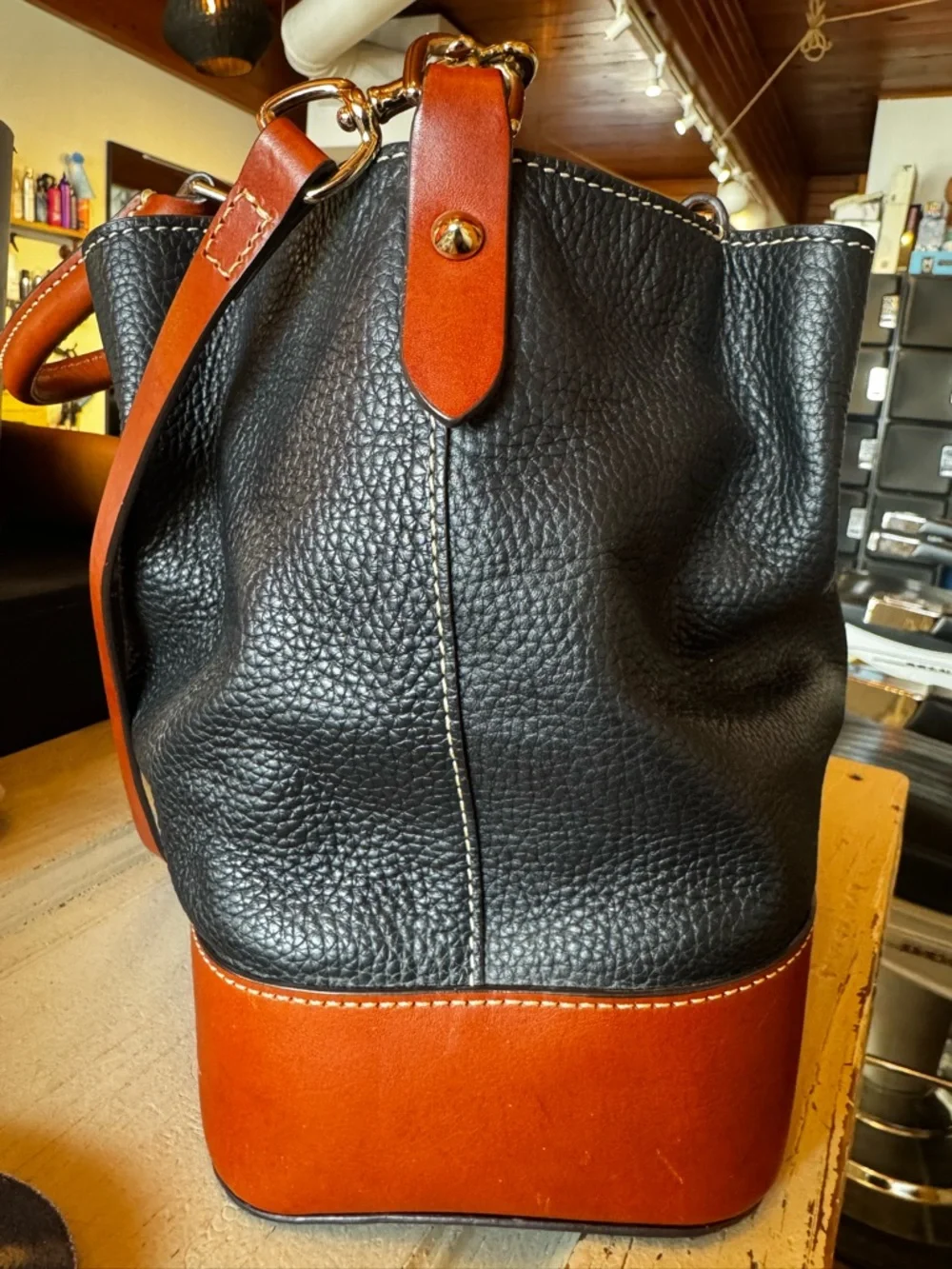 Dooney & Bourke Black Leather Tote with Brown Trim and Handles - Picture 5 of 10